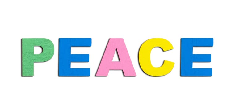 Peace, word written in colorful wooden alphabet letters isolated. The concept of a terrible war destroying country. Top view. Copy space