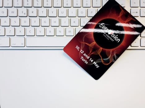 Turin, ITA, May 2022: Badge with the Eurovision Song Contest artwork and the date of the event on a computer keyboard. The ESC is an international songwriting competition organized annually by the