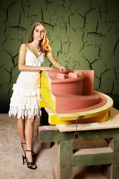 Woman with the wooden model