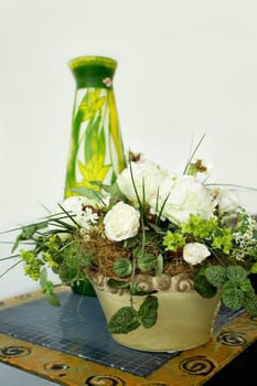 Vase with artificial bouquet