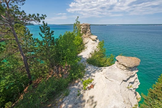 Sandstone Crags Over a Blue Lake at the Miners Castle in Pictured Rocks National Lakeshore in Michigan