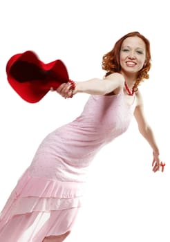 Laughing woman throws her hat