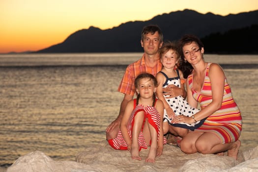 Young family at sunset