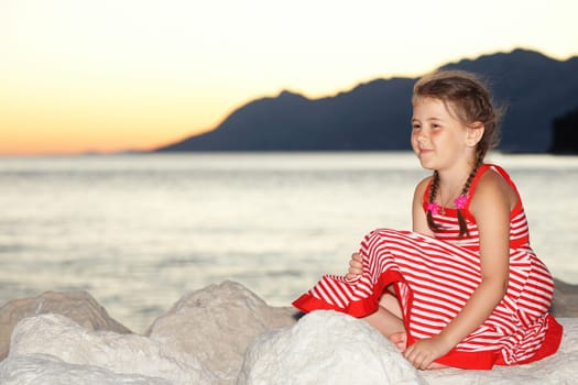Little girl at sunset