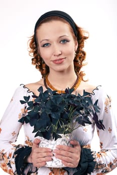 Root-haired woman with the house flower II.