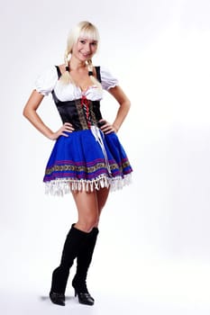 Blonde woman in traditional costume I.