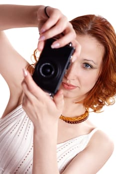 Red-haired woman photographing II.