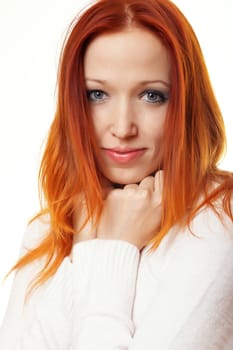 Red-haired woman in white sweater