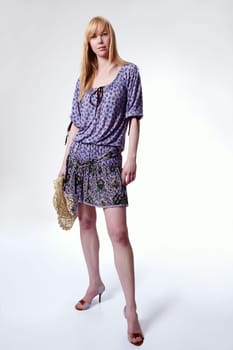 Slim woman in summer dress