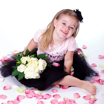 Little girl with bunch of flowers II