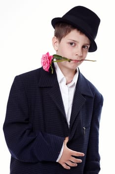 Portrait of a young boy wearing a suit and a hat