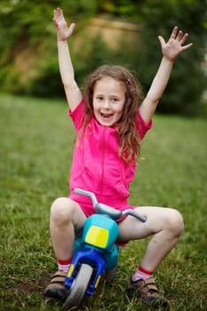 Portrait of a girl with a motorbike