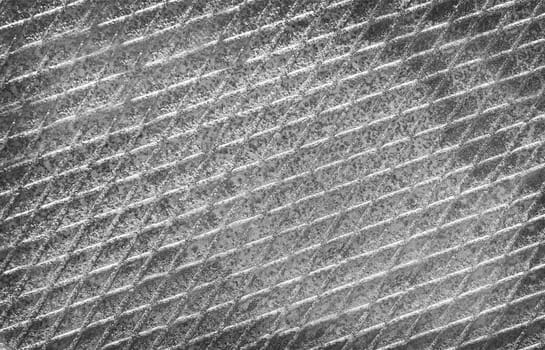 The Old gray ribbed steel background. Relief metal texture