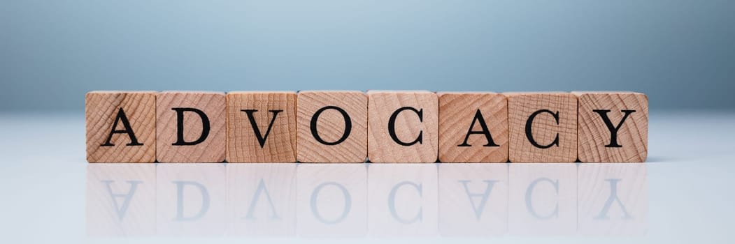 Advocacy Word Made Using Wooden Blocks. Brand Advocacy Concept