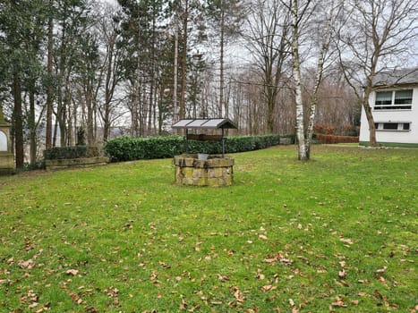 Ancient draw-well in European village