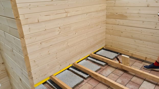 Garden shed built from tree trunks