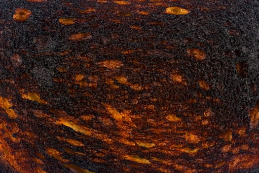 top view macro closeup of black burnt toast bread slice texture background