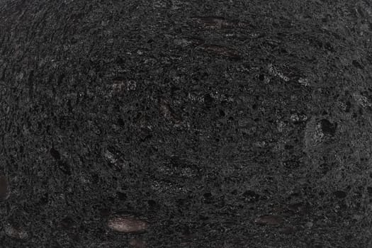 top view macro closeup of black burnt toast bread slice texture background