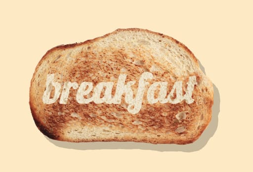 top view closeup slice of bread with word breakfast on it isolated on light brown background