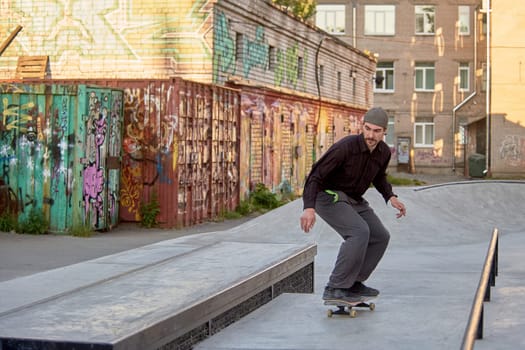 a skateboarder rides a skateboard in a skatepark. High quality photo