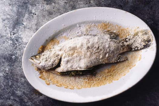 close up of sicilian italian salt baked seabass fsh