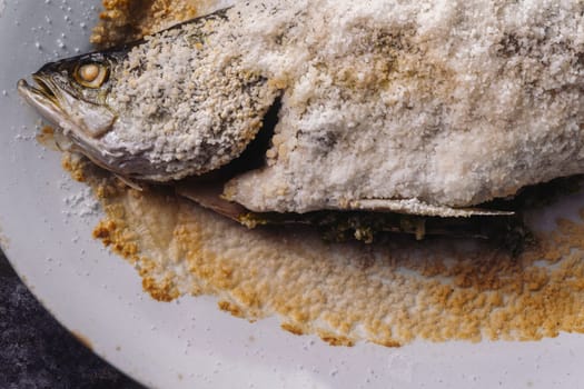 close up of sicilian italian salt baked seabass fsh