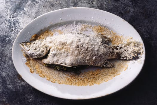 close up of sicilian italian salt baked seabass fsh