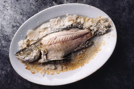 close up of sicilian italiansalt baked seabass fsh