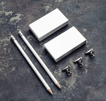 Blank business cards, pencils and clips. Template for graphic designers portfolios.
