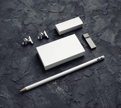 Blank stationery set on black plaster background. Mockup for branding identity for designers.