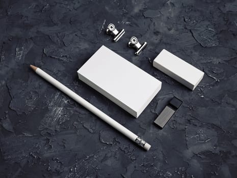 Blank branding identity set on black plaster background. Corporate stationery template. For design presentations and portfolios.