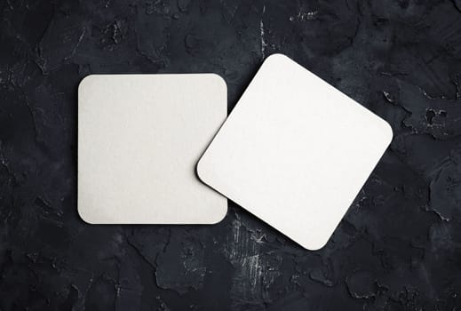 Two blank square beer coasters. Responsive design template. Top view.
