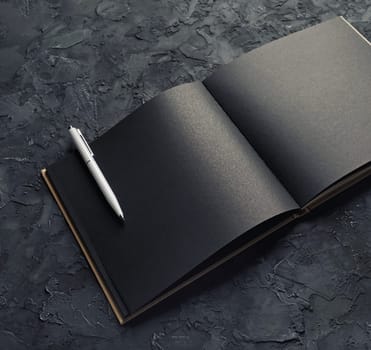 Blank black booklet and pen mock up. Template for placing your design.