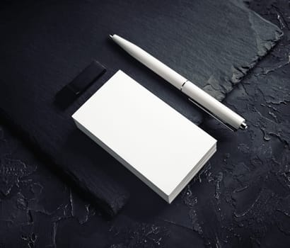 Photo of blank business cards, pen and usb flash drive. Branding identity template.