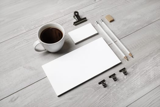 Blank corporate stationery mockup on light wooden background. Branding mock up for designers portfolios.