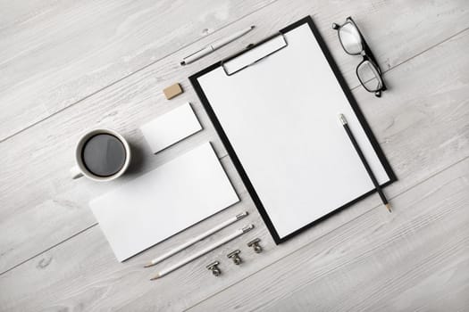 Branding stationery mockup on light wooden background. Blank objects for placing your design. Flat lay.