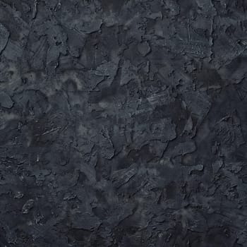 Black plaster texture. Black stucco wall background. Top view.
