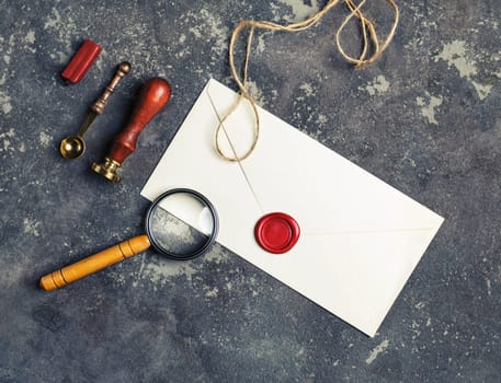 Vintage postal stationery set on concrete background. Top view.