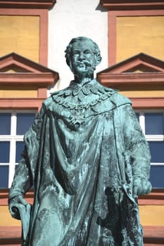 The monument to King Maximilian II of Bavaria stands in front of the Old Palace in Bayreuth on the courtyard. The statue of the Maximilian monument was cast in 1860 and stands on a granite base.