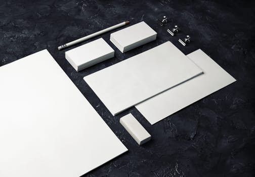 Blank corporate identity. Stationery template on black plaster background. Branding mockup.