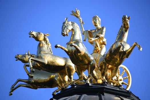 The Temple of the Sun in the Hermitage Bayreuth shows the gilded Apollo with torch,quadriga and horses. The temple was built in the park in 1753