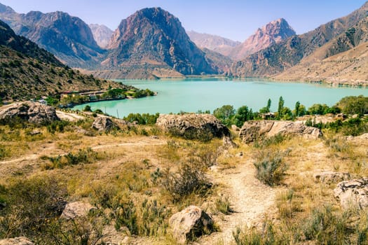 Scenic view of Iskanderkul - an alpine lake in the mountains of Tajikistan