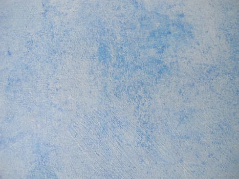 Wood painted with blue chalk paint and paint roller in vintage style