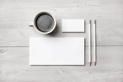 Corporate identity template. Branding mock up. Blank business stationery mock-up on light wooden background. Flat lay.