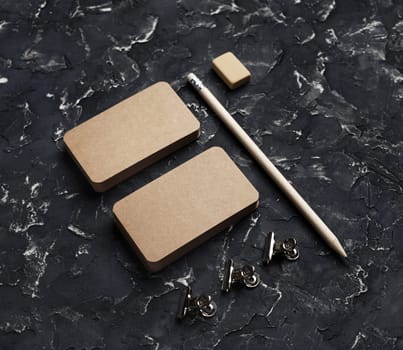 Blank vintage stationery set. Blank kraft business cards, pencil and eraser. Mockup for branding identity.