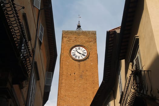 The historical clock tower in the center of the city of Orvieto in Italy