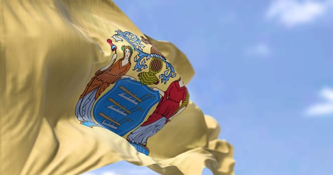 The US state flag of New Jersey waving in the wind. New Jersey is a state in the Mid-Atlantic and Northeastern regions of the United States. Democracy and independence.