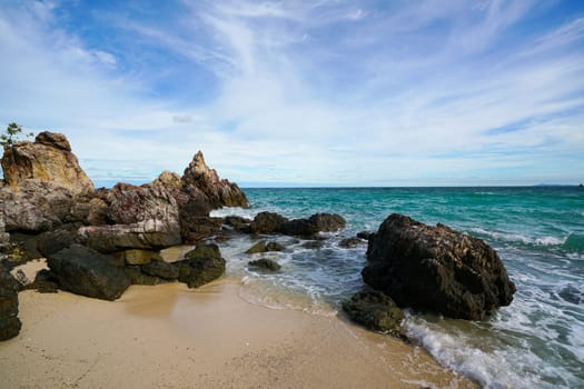 Sand beach among rocks, koh lan island thailand