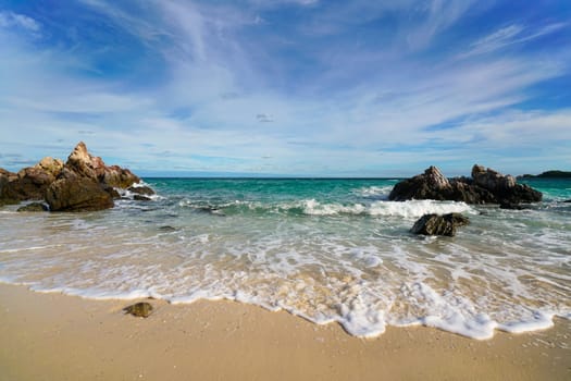 Sand beach among rocks, koh lan island thailand