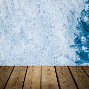 Background flowers on a textured stucco wall and blank wooden planks in the foreground. For product demonstrations, free space, layout, mockup, perspective board, background board.